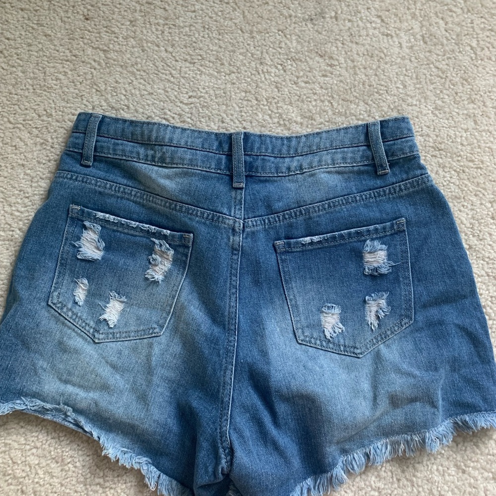Distressed denim shorts